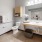 a bathroom with a sink toilet and mirror