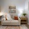 a living room with a couch and a table