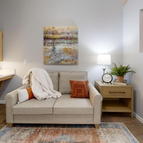Gorgeous living areas to entertain and enjoy a living room with a couch and a table