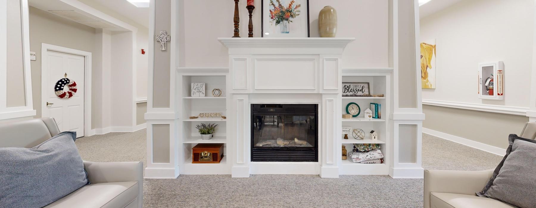 a living room with a fireplace