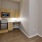 a kitchen with a microwave oven